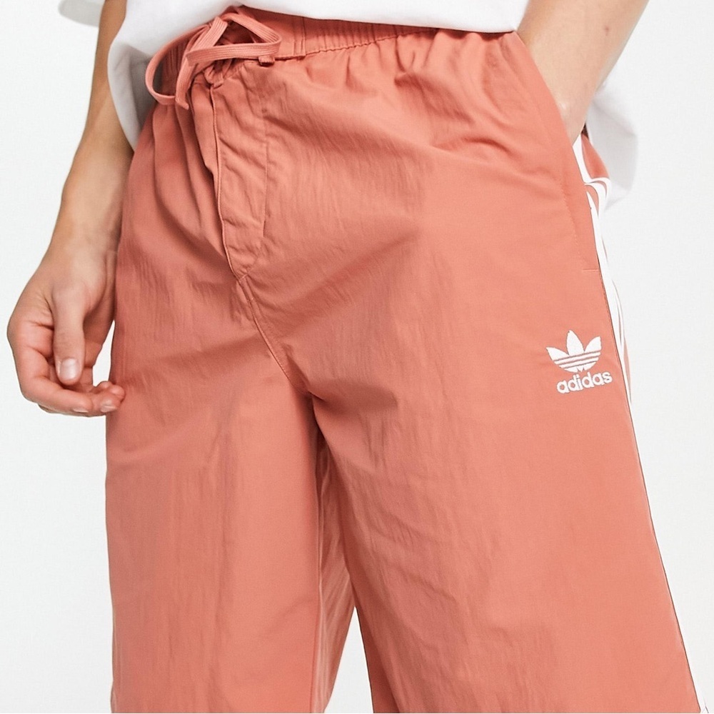 adidas Originals adicolor three stripe 10 inch shorts in beige